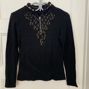 Elldos shiny black sweater, mid zip with a lot of rich detail